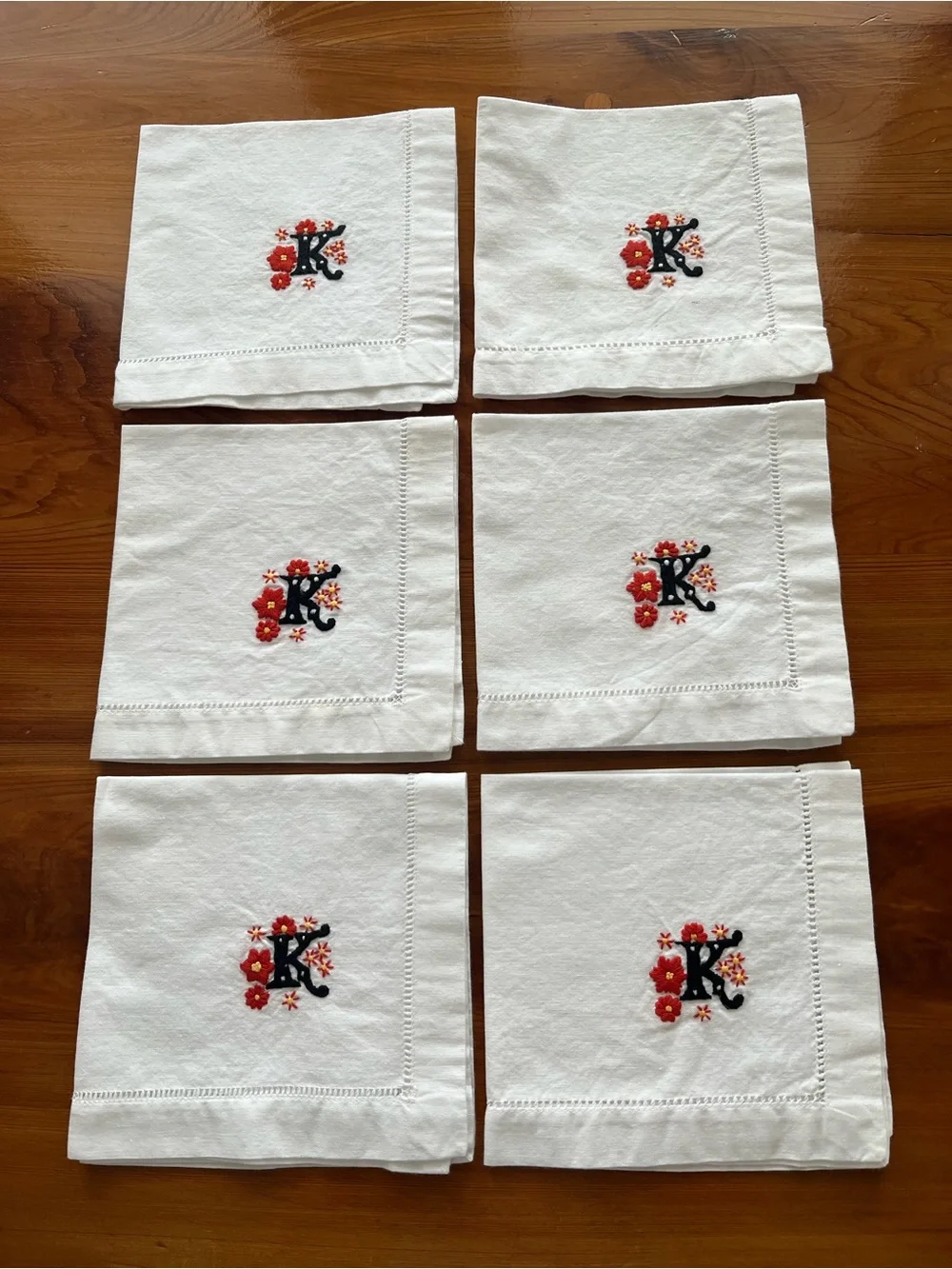 Set of 6 White Cotton Napkins w/Yellow and Orange Flowers and Black 'K' monogram